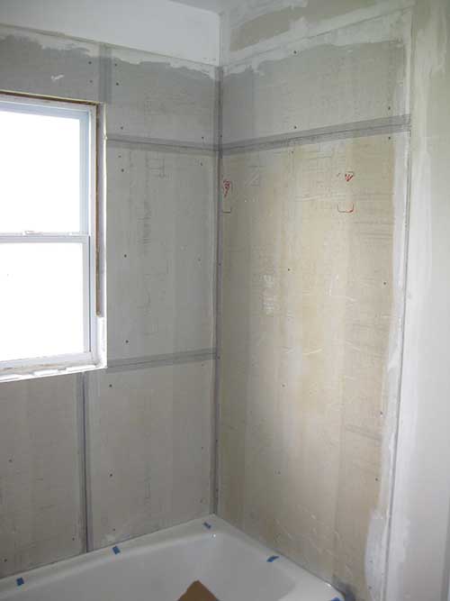 Concrete backer board. The old tile was laid over drywall….doing it right this time.